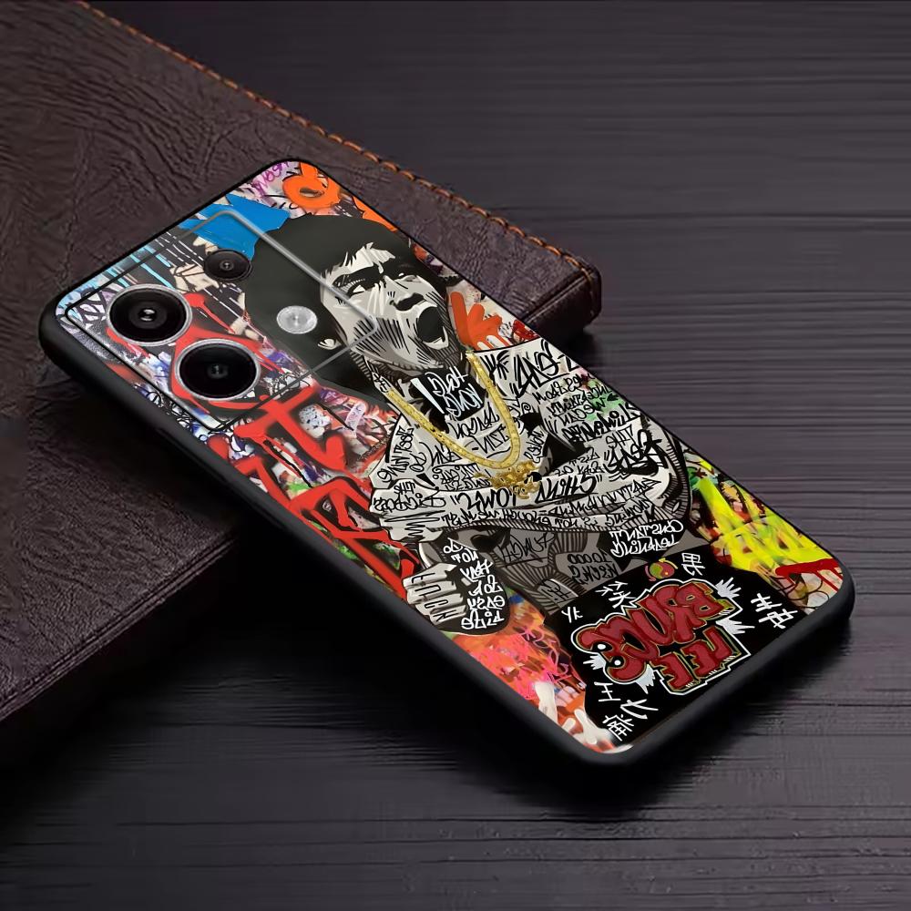 بانكسي الكتابة على الجدران الف - مراجعة Xiaomi Redmi Note 14 وسعره